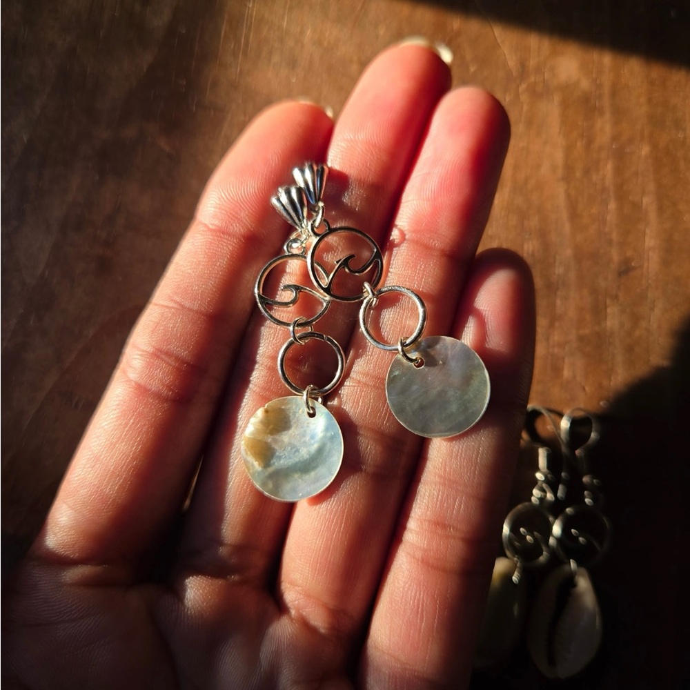 High Tide Silver Handcrafted Shell Earrings with Decorative Wave Metalwork